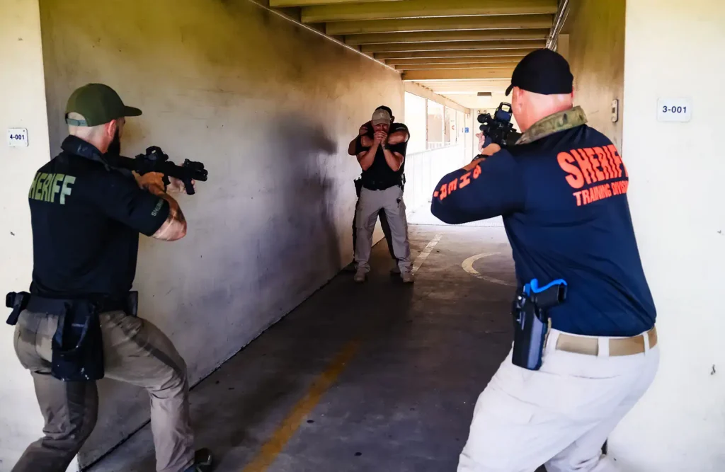 Two officers in hostage rescue situation during cqc training course