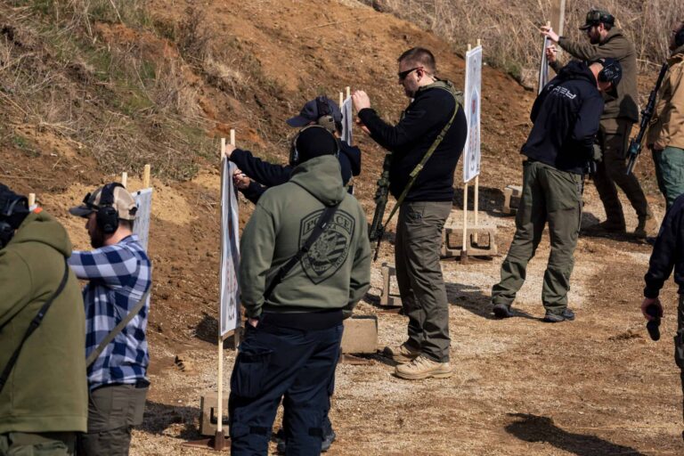 Students checking targets for holdover data at 5 to 100 yards during LPVO instructor course