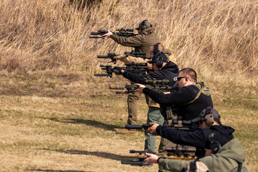 Students gathering holdover data during LPVO instructor training course by High Threat Training Group.